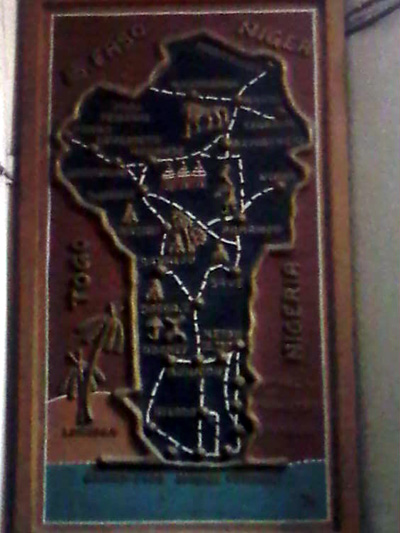 Pix 5: Framed hand crafted map of Benin Republic bounded by neighboring West African states – displayed in the reception of a hotel.